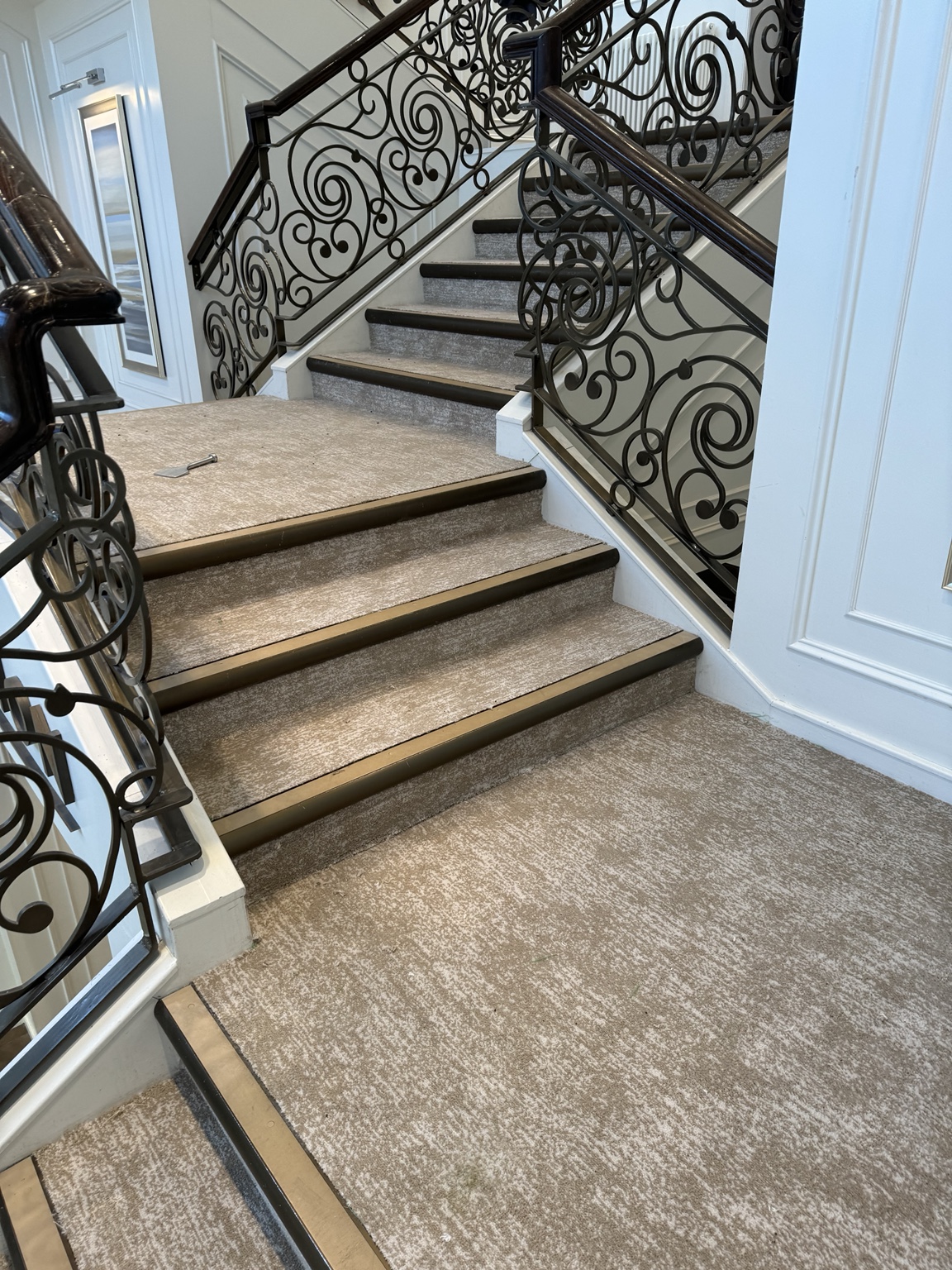 Commercial stair carpet finished with dark stair nosings
