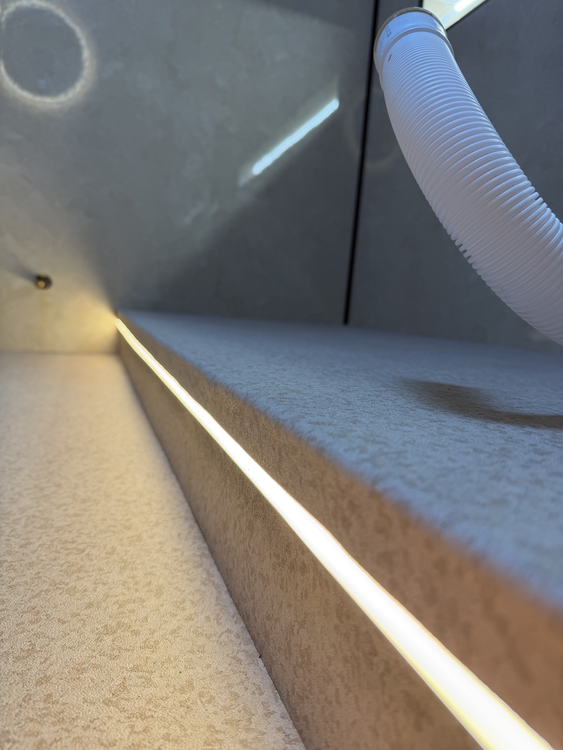 Close-up of a precisely finished illuminated stair edge