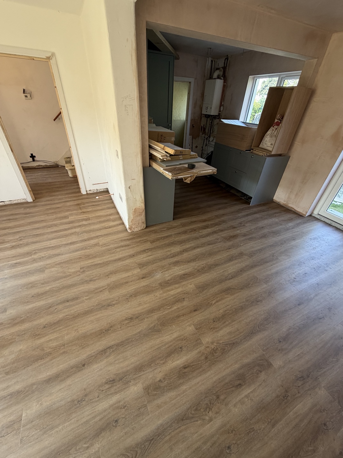 Plank LVT fitted across an open-plan domestic interior