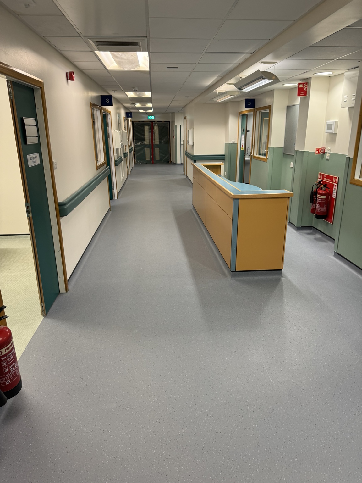 Altro safety flooring fitted around a ward reception and clinical rooms