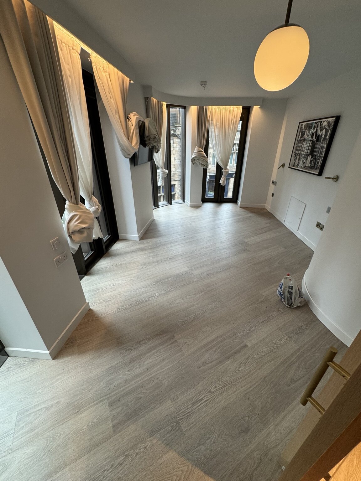 Karndean LVT installed through a bright hotel suite
